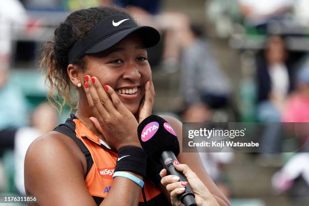 Singles champion Naomi Osaka of Japan celebrates after winnings the Singles final agains Anastasia Pavlyuchenkova of Russia during day seven of the...