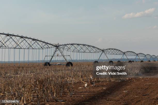 large agricultural irrigation machine used to spray dry crops with water - drought stock pictures, royalty-free photos & images