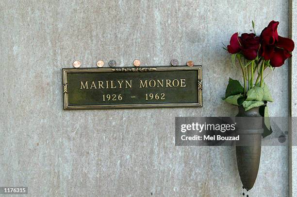 The grave site of late actress Marilyn Monroe is seen on July 26, 2002 at the The Westwood Village Memorial Park and Mortuary in Westwood,...