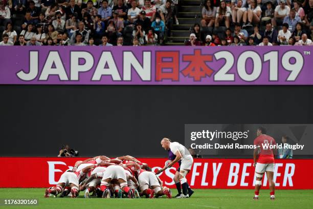 Players scrum during the Rugby World Cup 2019 Group C game between England and Tonga at Sapporo Dome on September 22, 2019 in Sapporo, Hokkaido,...