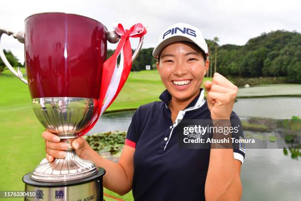 Hinako Shibuno of Japan poses with the trophy after winning the tournament following the final round of the Descente Ladies Tokai Classic at Shin...