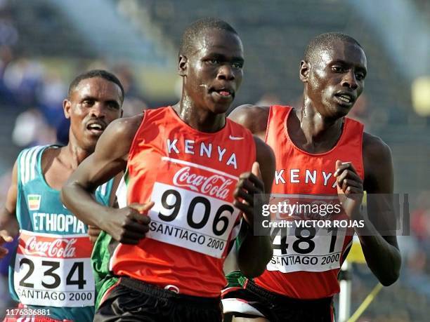 Kenyan runners Robert Kipchumba and Duncan Lebo run in the final of the 10,000m race 17 October during the VIII World Junior Championship in...