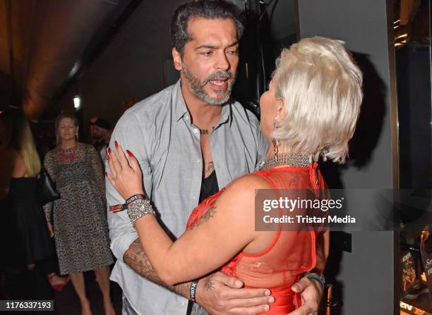 Aurelio Savina and Ginger Wollersheim attend the VISIT-X "Night Of The Nights" party at Hotel Amano Grand Central on October 16, 2019 in Berlin,...