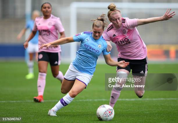 Jess Park of Manchester City Women holds off a challenge from Hayley James of Leicester City Women during The FA Continental League Cup between...