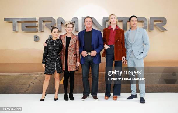 Natalia Reyes, Linda Hamilton, Arnold Schwarzenegger, Mackenzie Davis and Gabriel Luna pose at a photocall for "Terminator: Dark Fate" at the...