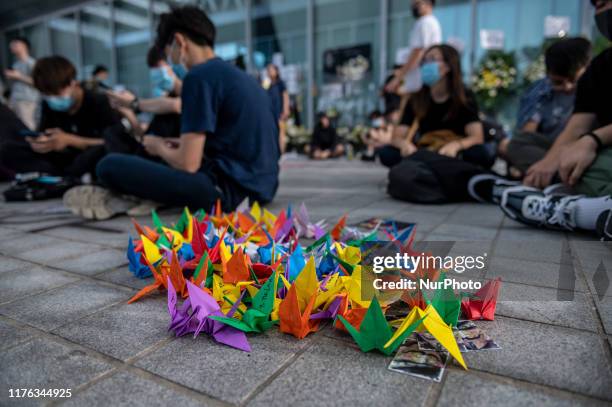 Paper Cranes are seen placed on the ground inside Hong Kong Design Institute in Hong Kong, China, October 17, 2019.