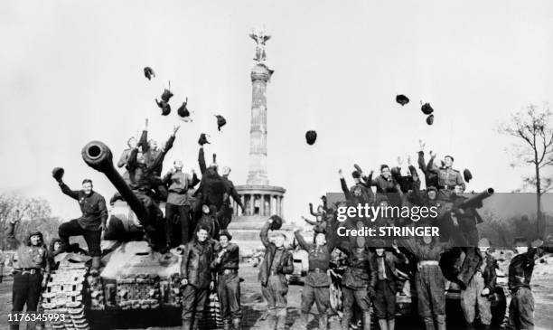 Picture taken in May 1945 shows Soviet Army soldiers celebrating in Berlin. AFP PHOTO / RIA NOVOSTI