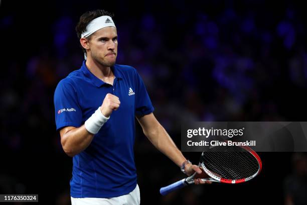 Dominic Thiem of Team Europe celebrates winning the second set tiebreak in his singles match against Taylor Fritz of Team World during Day Three of...