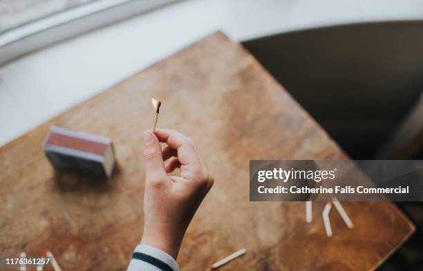 strike a match - matchstick ignition stock pictures, royalty-free photos & images