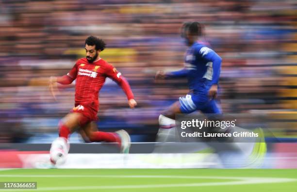 Mohamed Salah of Liverpool runs with the ball during the Premier League match between Chelsea FC and Liverpool FC at Stamford Bridge on September 22,...