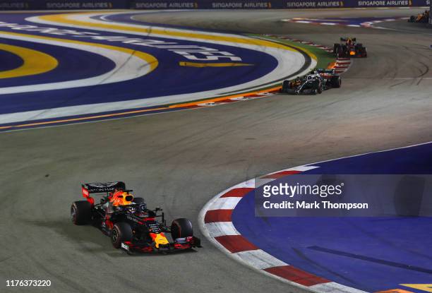 Max Verstappen of the Netherlands driving the Aston Martin Red Bull Racing RB15 on track during the F1 Grand Prix of Singapore at Marina Bay Street...