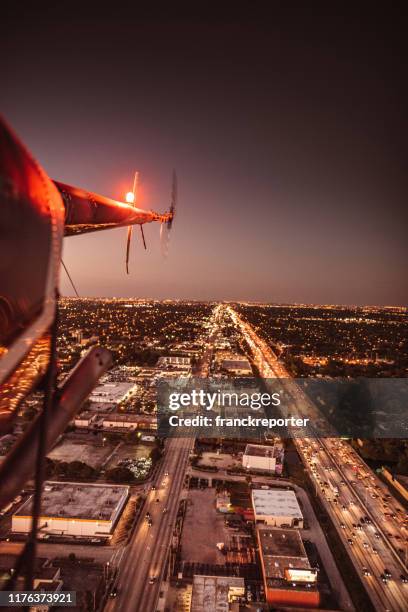 flying over miami with the helicopter - aerodrome stock pictures, royalty-free photos & images