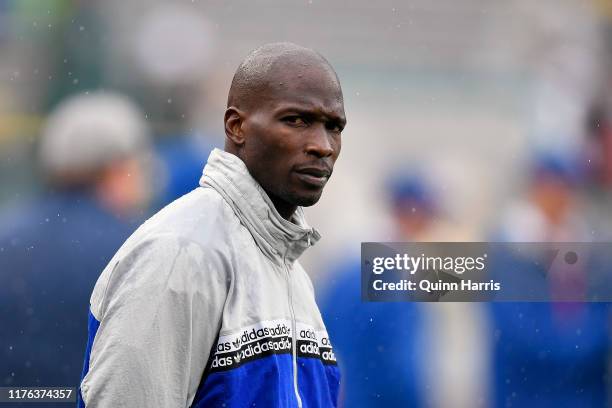 Former All-Pro wide receiver Chad Javon Johnson, known from 2008–2012 as Chad Ochocinco, stands on the sideline before the game between the Green Bay...