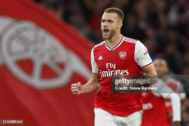 Calum Chambers of Arsenal celebrates after scoring his team's second goal during the Premier League match between Arsenal FC and Aston Villa at...