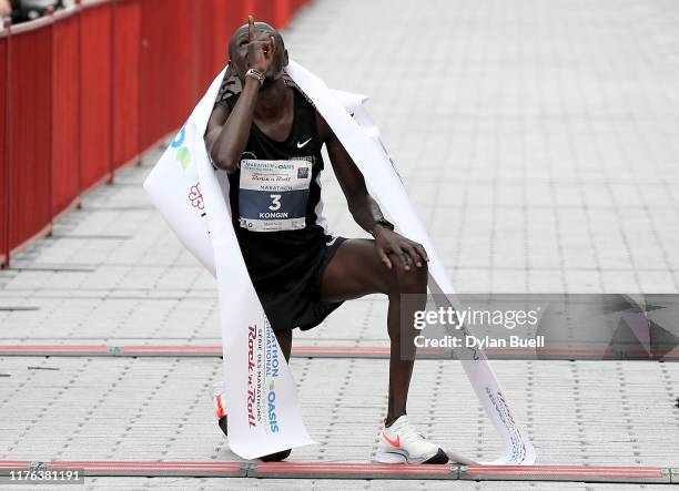 Boniface Kongin of Kenya celebrates after winning the marathon during Oasis International Marathon de Montreal - Day 2 on September 22, 2019 in...