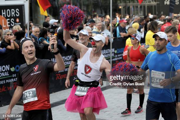 Stephanie Dubreuil of Canada finishes the half marathon during Oasis International Marathon de Montreal - Day 2 on September 22, 2019 in Montreal,...