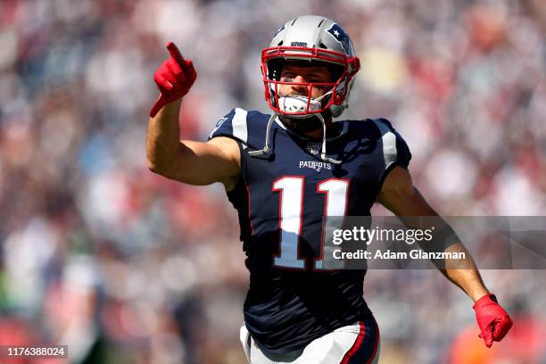 Julian Edelman of the New England Patriots points prior to the game against the New York Jets at Gillette Stadium on September 22, 2019 in...