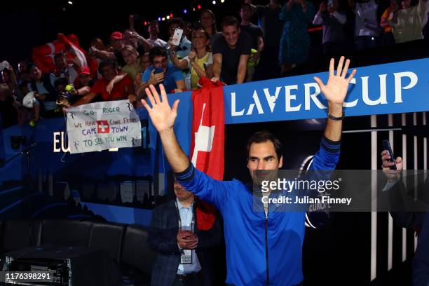 Roger Federer of Team Europe acknowledges the fans as he celebrates after winning the Laver Cup during Day Three of the Laver Cup 2019 at Palexpo on...