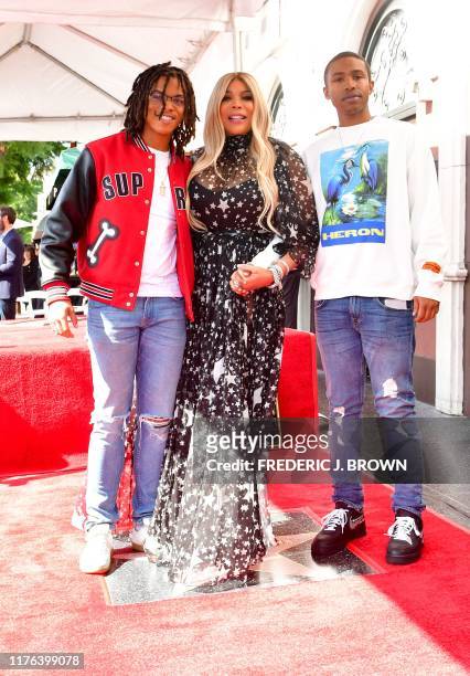 Talk Show Host Wendy Williams, her son Kevin Hunter Jr. And her nephew pose after she was honored with her star on the Hollywood Walk of Fame on...