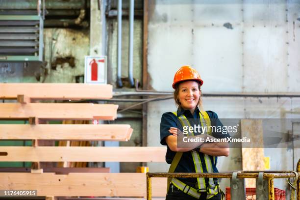 proud woman working in industry - forestry stock pictures, royalty-free photos & images