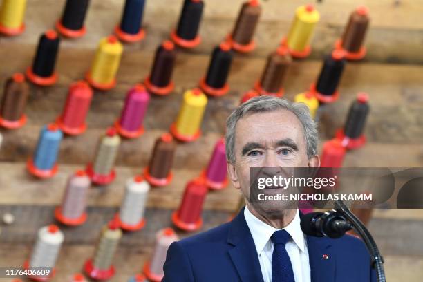 Chief Executive of LVMH Bernard Arnault speaks during a visit to the new Louis Vuitton factory in Alvarado , Johnson County, Texas on October 17,...