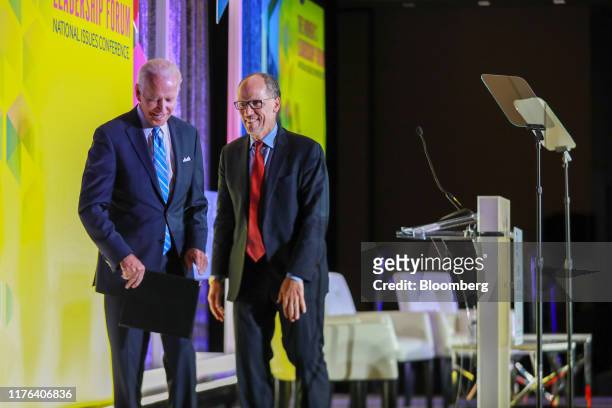 Former U.S. Vice President Joe Biden, a 2020 Democratic presidential candidate, and Tom Perez, chairman of the Democratic National Committee , exit...