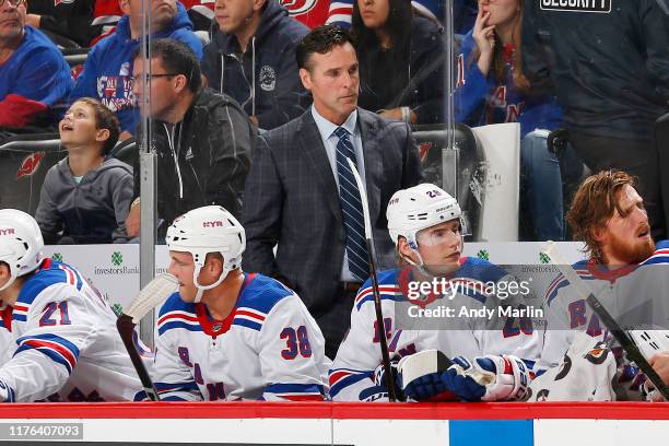 Head Coach David Quinn of the New York Rangers looks on during the game against the New Jersey Devils on October 17, 2019 at Prudential Center in...
