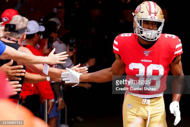 Antone Exum Jr. #38 of the San Francisco 49ers runs out on the field during warm ups prior to the game against the Pittsburgh Steelers at Levi's...