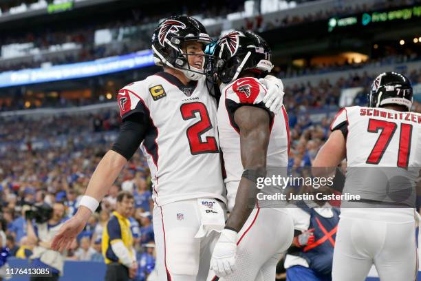 Matt Ryan and Julio Jones of the Atlanta Falcons celebrate after a touchdown pass in the game against the Indianapolis Colts at Lucas Oil Stadium on...