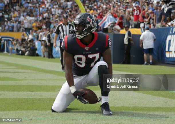 Darren Fells of the Houston Texans celebrates a touchdown against the Los Angeles Chargers in the second quarter at Dignity Health Sports Park on...