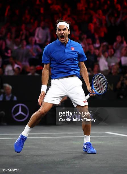 Roger Federer of Team Europe celebrates defeating John Isner of Team World during Day Three of the Laver Cup 2019 at Palexpo on September 22, 2019 in...