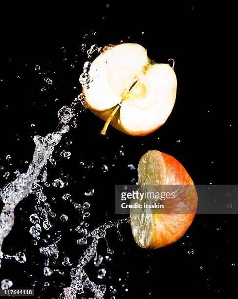 apples - apple water splashing stock pictures, royalty-free photos & images