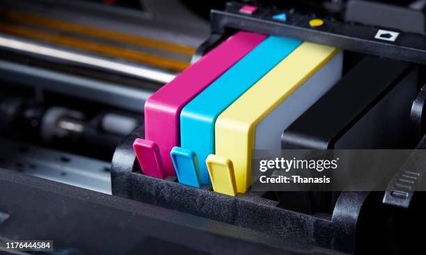 close-up of cartridge inks in computer printer - stock photo - inktjetcartridge stockfoto's en -beelden