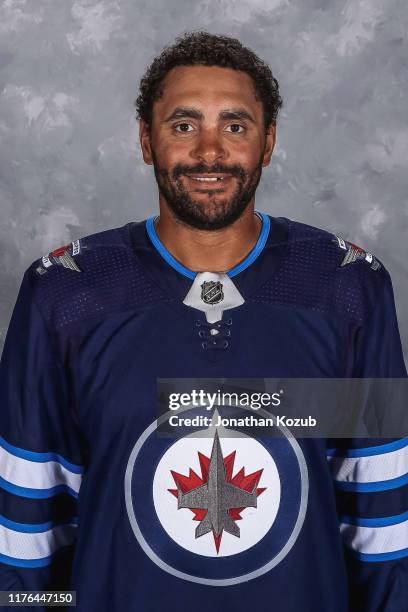 Dustin Byfuglien of the Winnipeg Jets poses for his official headshot for the 2019-2020 season on September 12, 2019 at the Bell MTS Iceplex in...