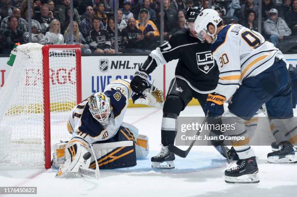 October 17: Carter Hutton and Marcus Johansson of the Buffalo Sabres protect the goal during the third period at STAPLES Center on October 17, 2019...