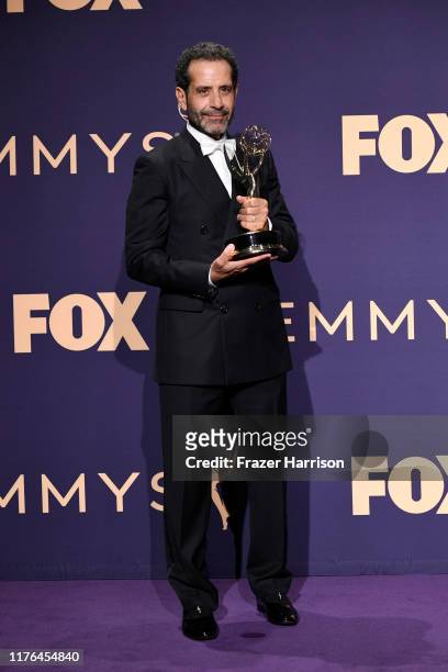 Tony Shalhoub poses with award for Outstanding Supporting Actor in a Comedy Series in the press room during the 71st Emmy Awards at Microsoft Theater...
