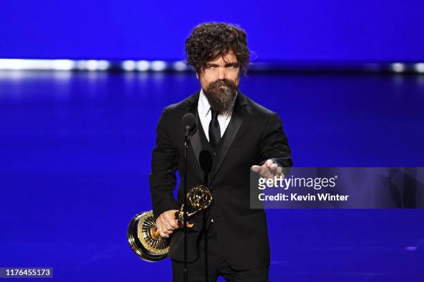Peter Dinklage accepts the Outstanding Supporting Actor in a Drama Series award for 'Game of Thrones' onstage during the 71st Emmy Awards at...