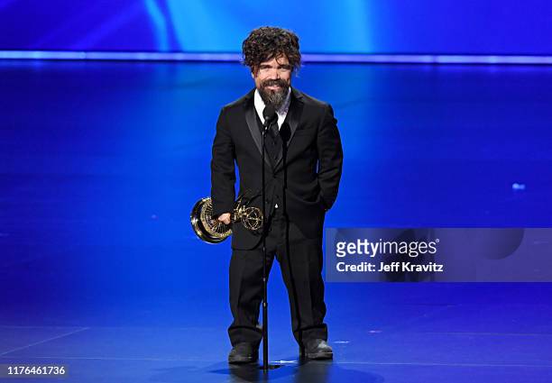 Peter Dinklage accepts the Outstanding Supporting Actor in a Drama Series award for 'Game of Thrones' onstage during the 71st Emmy Awards at...