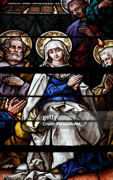 stained glass showing pentecost scene - holy spirit pentecost stock pictures, royalty-free photos & images