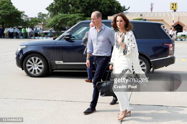 Prince William, Duke of Cambridge and Catherine, Duchess of Cambridge depart Lahore during their royal tour of Pakistan on October 18, 2019 in...
