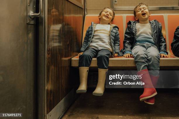 boys taking the subway - new york city life stock pictures, royalty-free photos & images