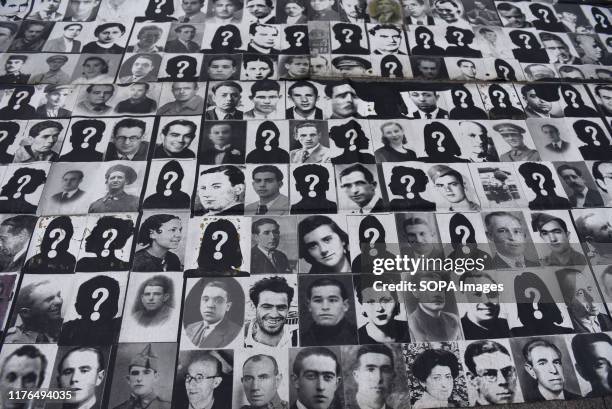 Pictures of missing people during the protest. Around 50 people gathered in Madrid to protest against immunity for the crimes committed during the...