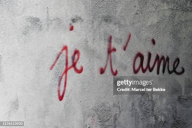 i love you  je t'aime - graffiti text stock pictures, royalty-free photos & images