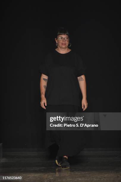 Fashion desinger Alexandra Moura acknowledges the applause of the audience walks the runway at the Alexandra Moura show during the Milan Fashion Week...