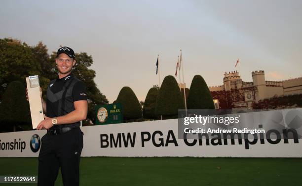 Danny Willett of England poses with the trophy after winning the BMW PGA Championship at Wentworth Club on September 22, 2019 in Virginia Water,...