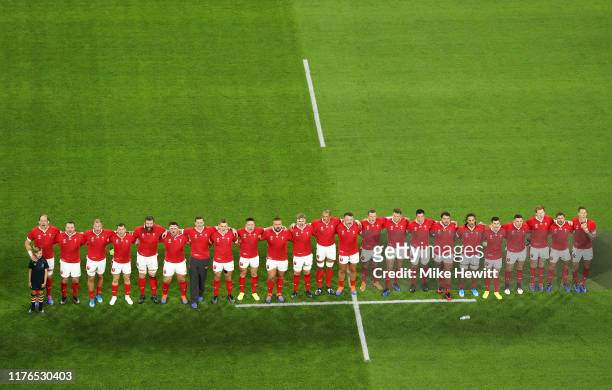 The Wales team line up for the national anthem prior to the Rugby World Cup 2019 Group D game between Wales and Georgia at City of Toyota Stadium on...