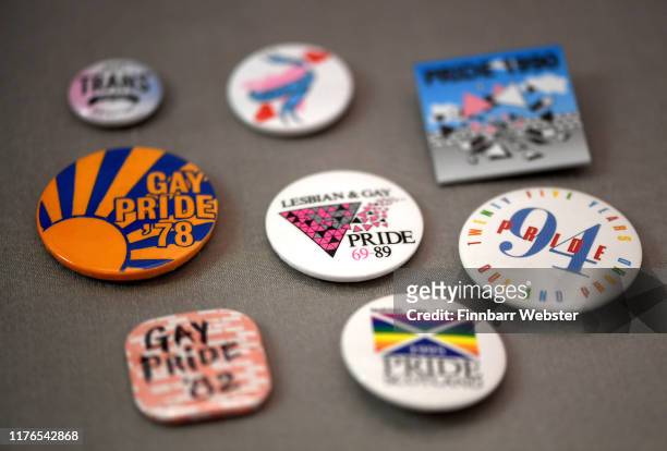 Badges worn by people over the years to show support for LGBTQ rights, on display on September 23, 2019 in Dorchester, England. The touring...