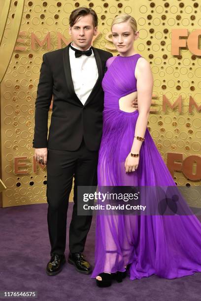 Mark Foster and Julia Garner attend the 71st Emmy Awards at Microsoft Theater on September 22, 2019 in Los Angeles, California.