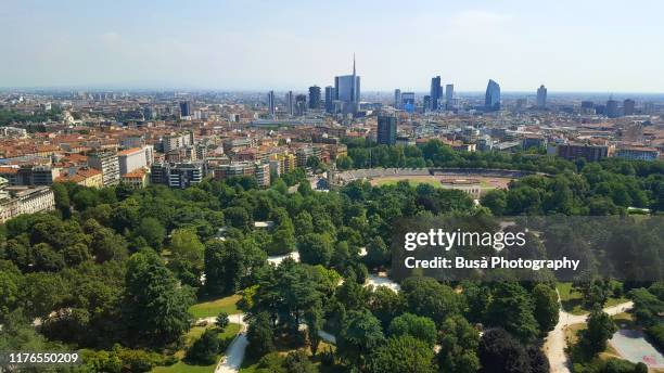 aerial view of the porta nuova downtown district from parco sempione. milan, italy - milano porta nuova foto e immagini stock