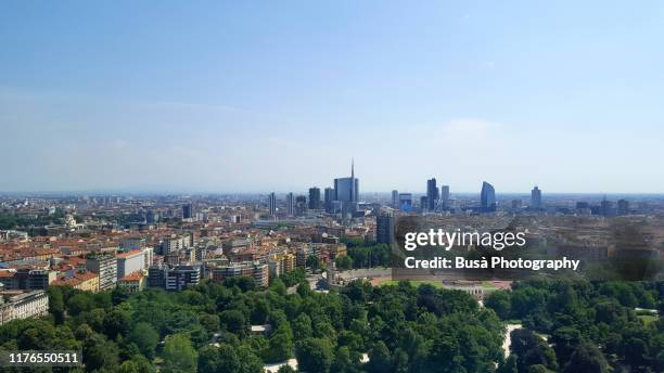 aerial view of the porta nuova downtown district from parco sempione. milan, italy - urban sprawl forest stock pictures, royalty-free photos & images